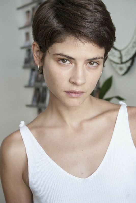 a short androgynous haircut or boyish pixie cut